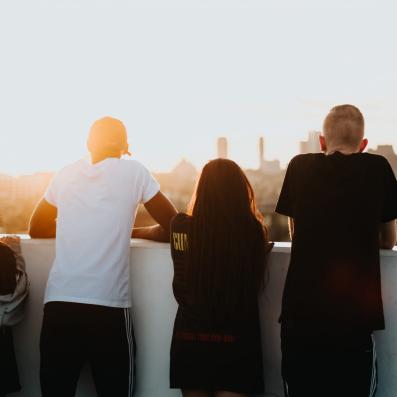 Kids overlooking city